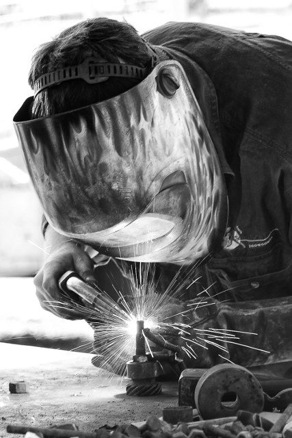 Metal sculptor welding