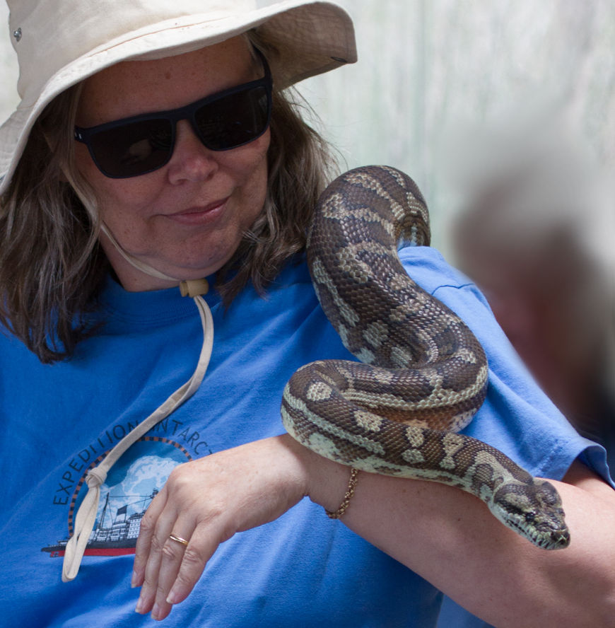 Photo of Leisa holding a python