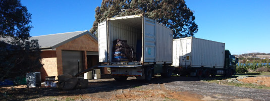 Removalist truck with 2 shipping containers